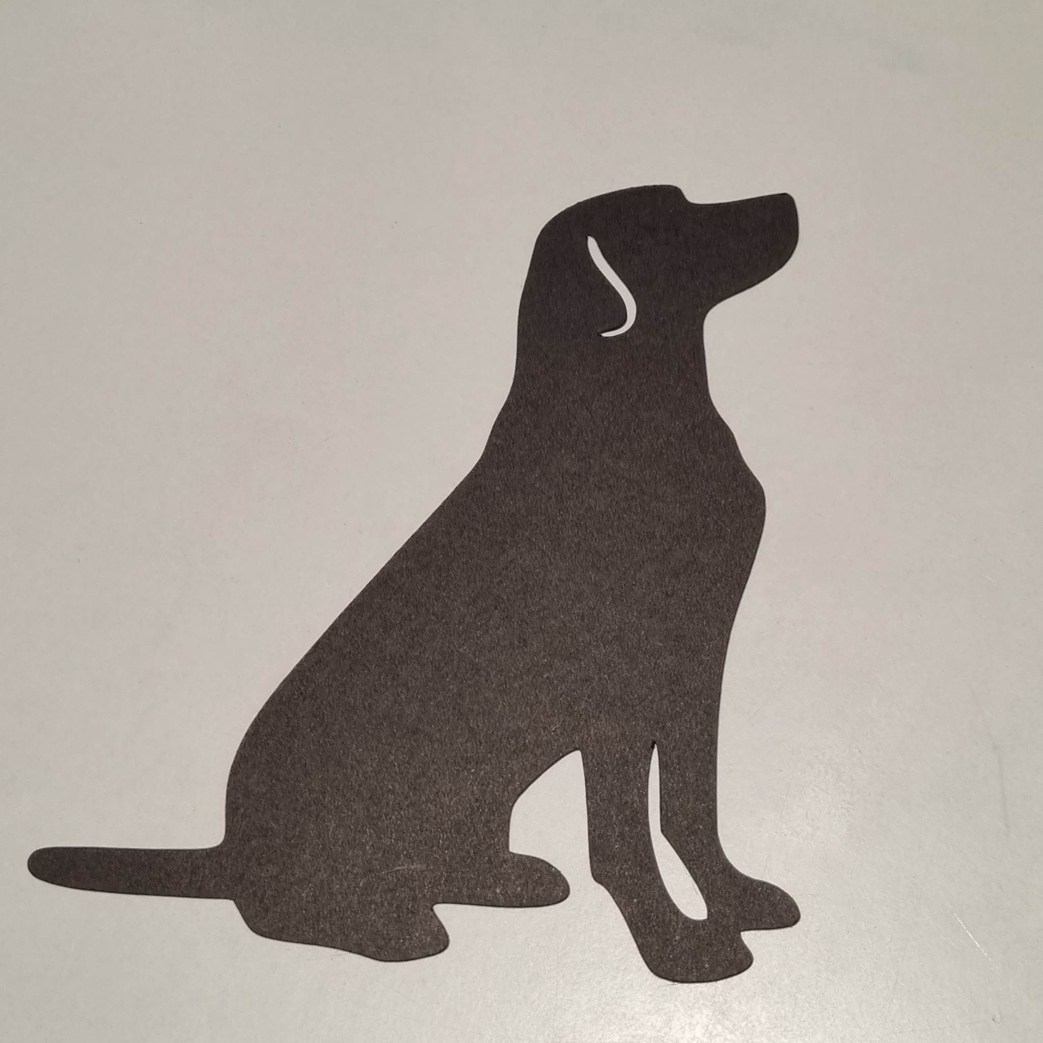 hond silhouet zitten